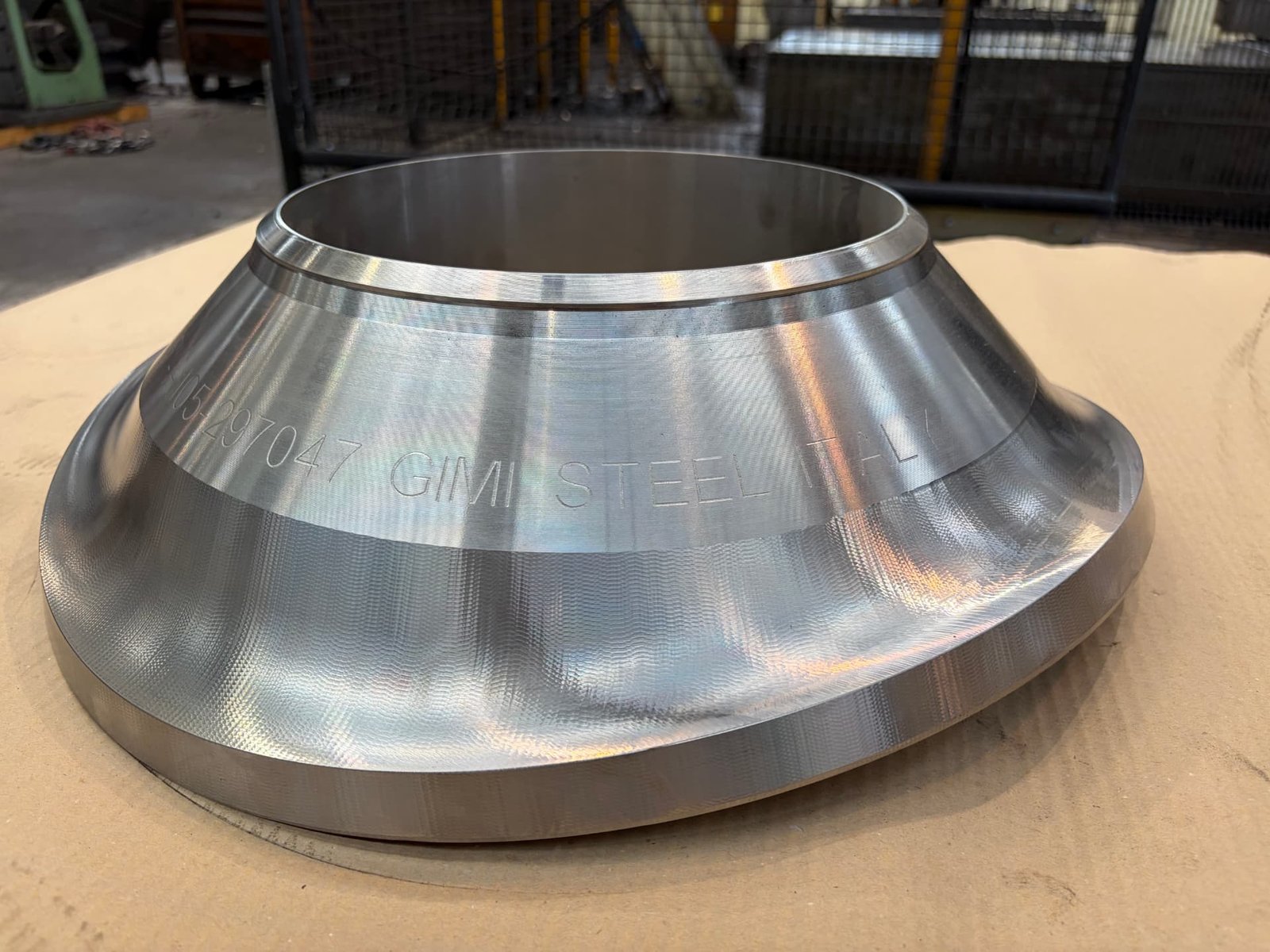 Machined forged insert outlet on a workshop bench